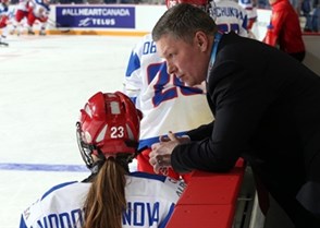 ST. CATHARINES, CANADA - JANUARY 8: Russia assistant coach Alexei Chistyakov has a conversation with Elena Vodopyanova #23 during warm up prior to preliminary round action against Canada at the 2016 IIHF Ice Hockey U18 Women's World Championship. (Photo by Jana Chytilova/HHOF-IIHF Images)

